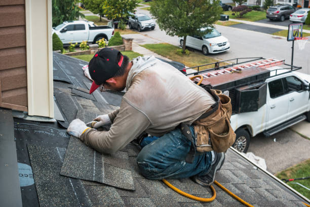 Professional Flat Roof Repair technician working in Brooktondale, NY